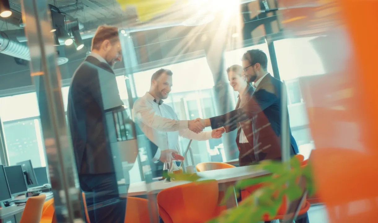 group-five-business-people-are-shaking-hands-office copy.jpg