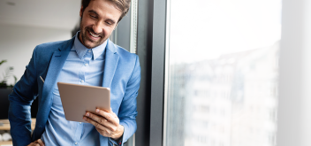 Man-Happy-Tablet-Office_HPslider