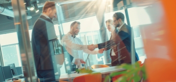group-five-business-people-are-shaking-hands-office copy.jpg
