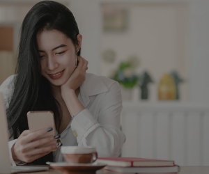 Woman using technology to self-serve