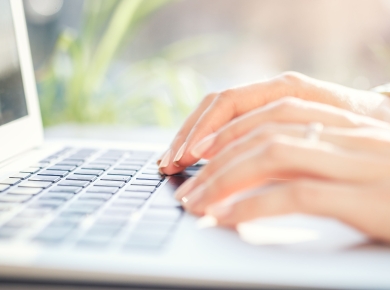 Image-female-office-worker-types-text-keyboard-girl-working-laptop 1